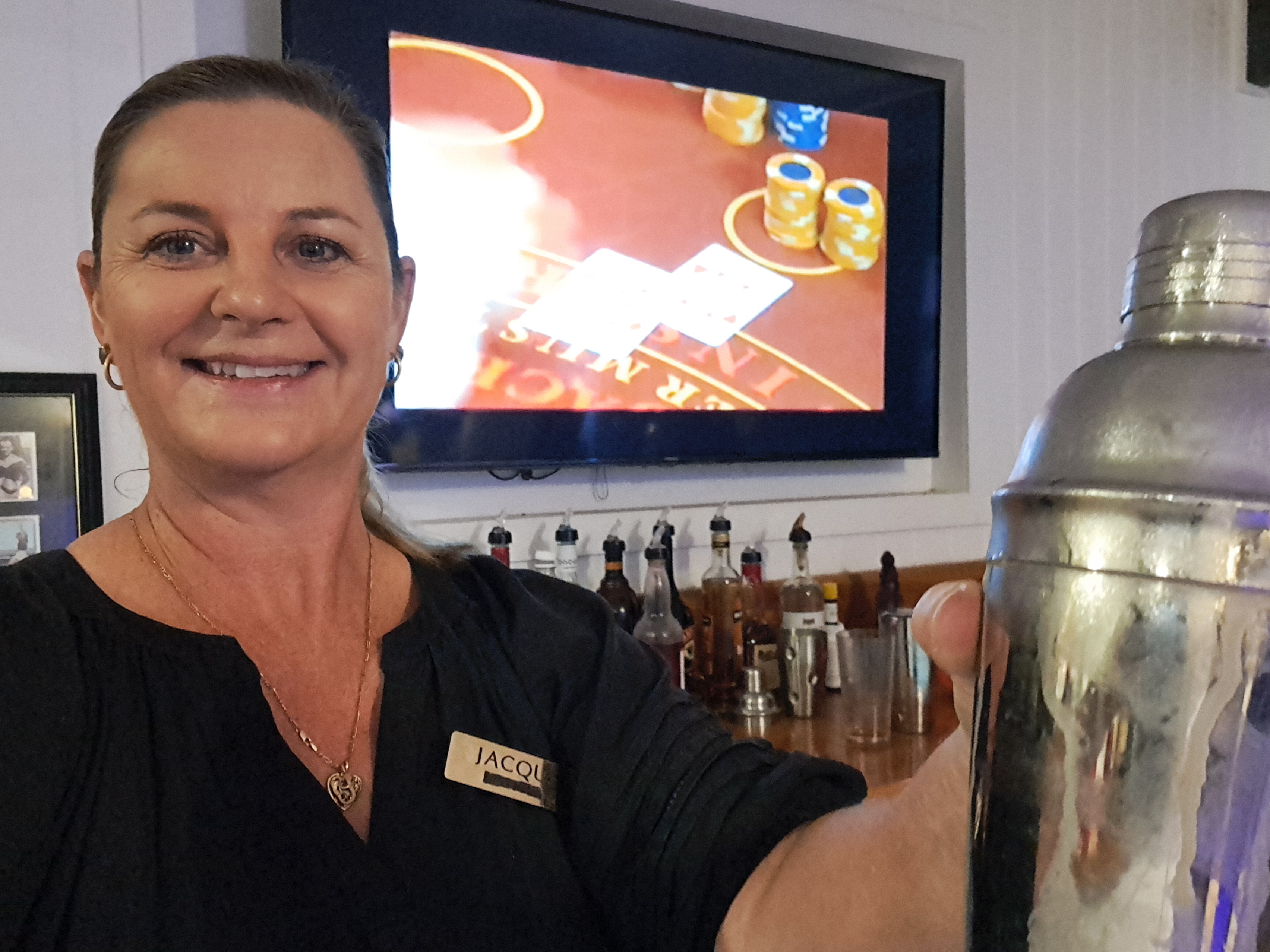 bartender holding a shaker